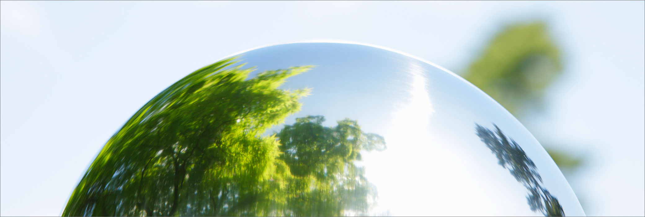 Mirror Half Sphere with Reflection of Trees and Sky